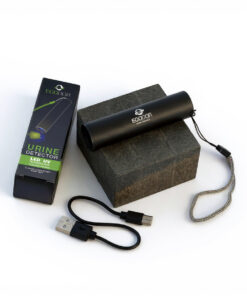Ecodor EcoLight oplaadbare UV‑urinedetector opgesteld op tafel